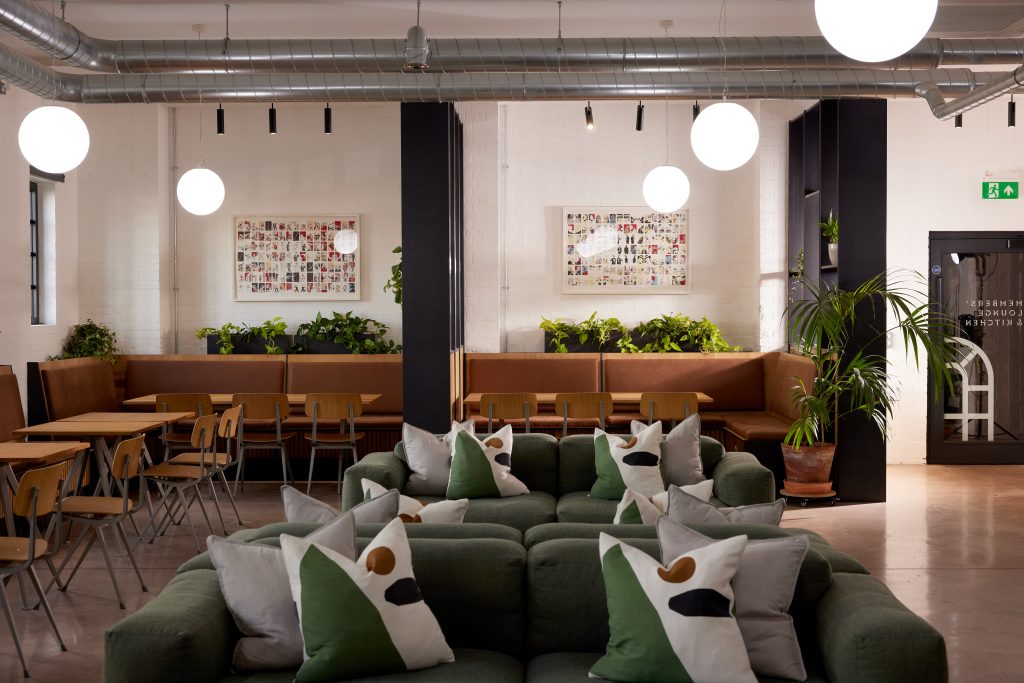 event space with wooden seating and sofas