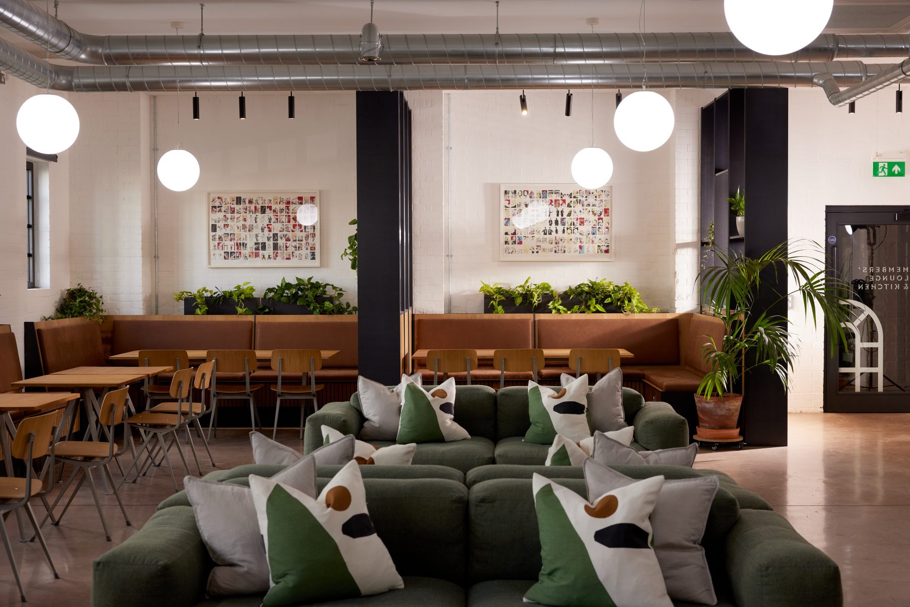 event space with wooden seating and sofas