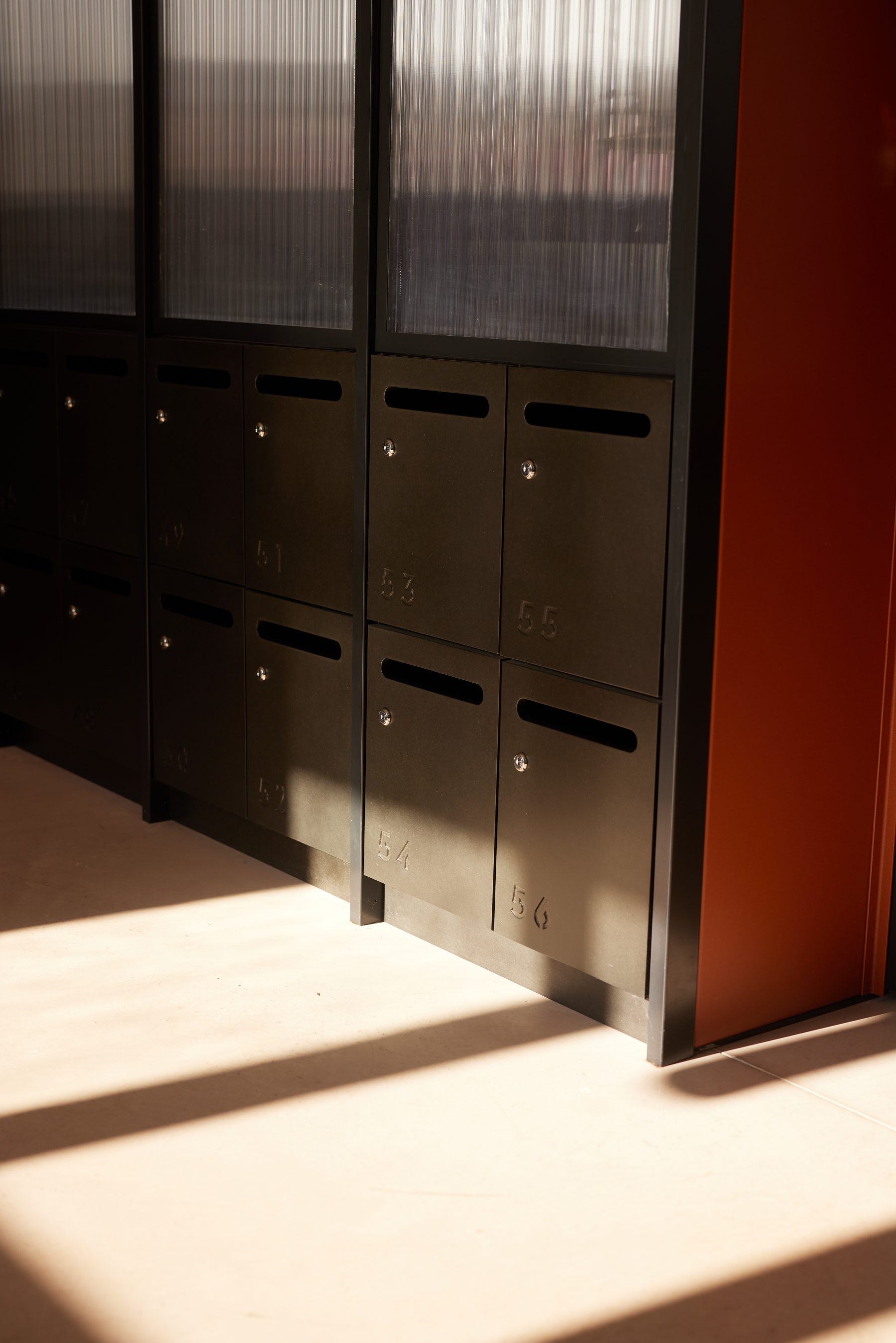 Numbered wooden mailboxes